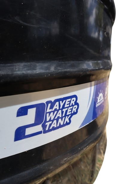 Close-up of a black Jumbo Tank wall with the printed "2 Layer Water Tank" band wrapped around the body.